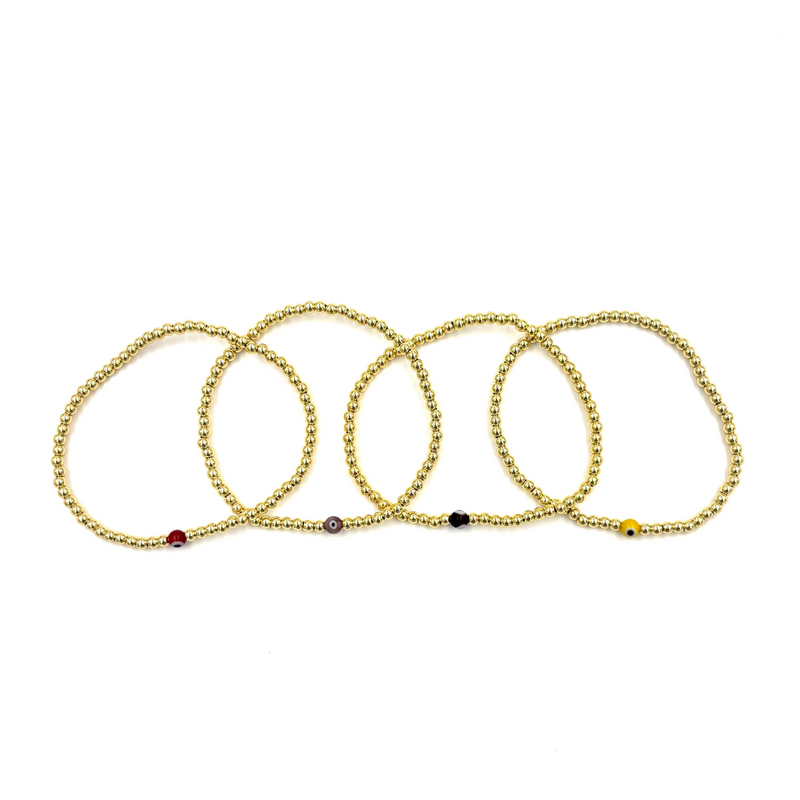 Ashley Gold Stainless Steel Gold Plated Single Evil Eye Beaded Ball Stretch Bracelet