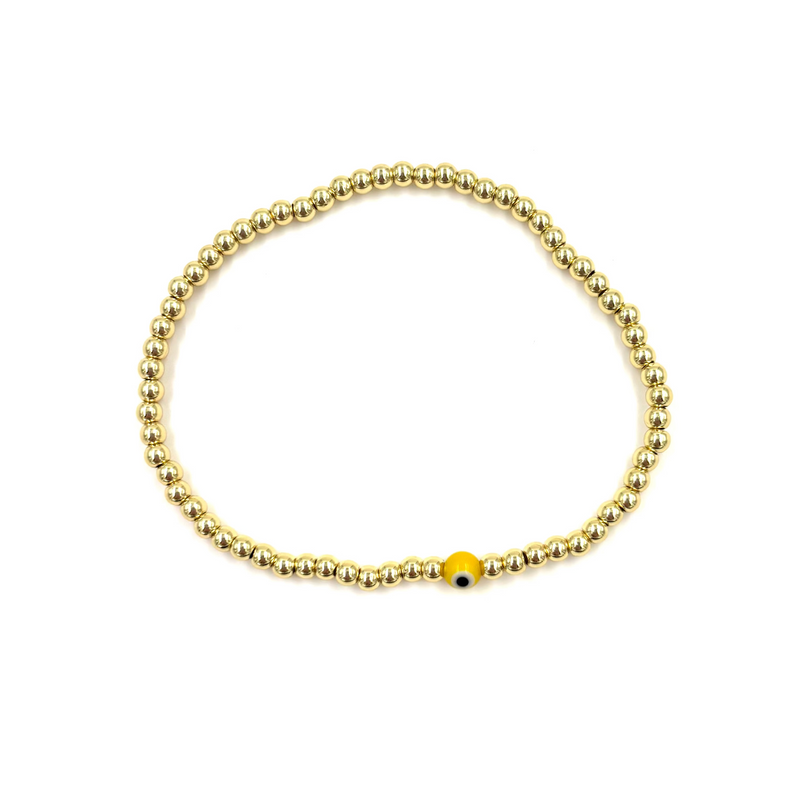 Ashley Gold Stainless Steel Gold Plated Single Evil Eye Beaded Ball Stretch Bracelet