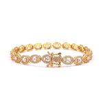 Ashley Gold Sterling Silver Gold Plated Round And Baguette CZ Design Tennis Bracelet