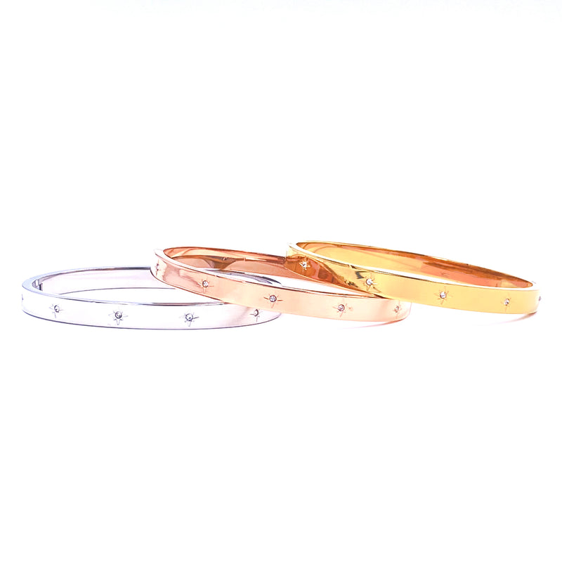 Ashley Gold Stainless Steel Mini Starburst Design Bangle Bracelet