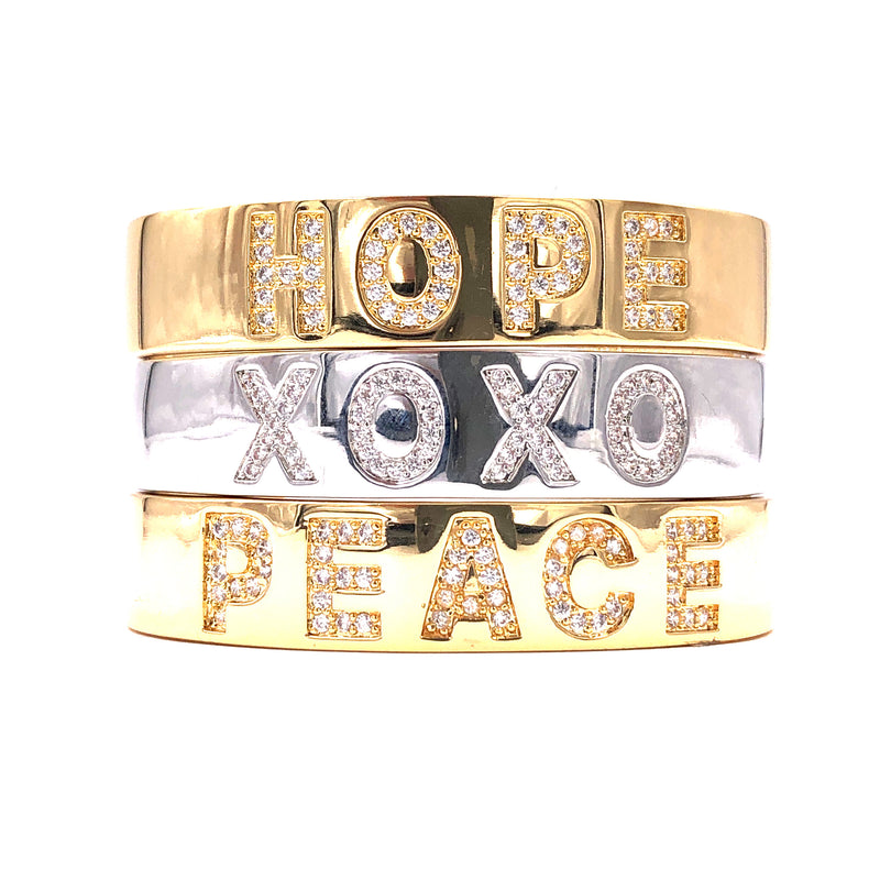 Ashley Gold Stainless Steel Cuff With CZ's And Slogan